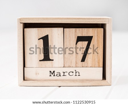 Wooden calendar that shows seventeenth of march