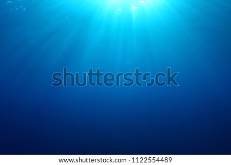 Blue ocean underwater background 