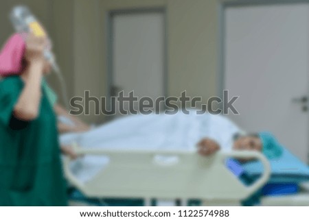 Blurred of medical team moving patient  to surgery in operating room at the hospital.