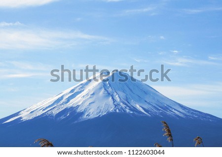 Close up of a peak of Mt Fuji seen from Kawaguchi lake in Yamanashi Prefecture on a sunny winter day