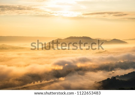 Sunrise and the mist in winter Landscape, view from top of mountain