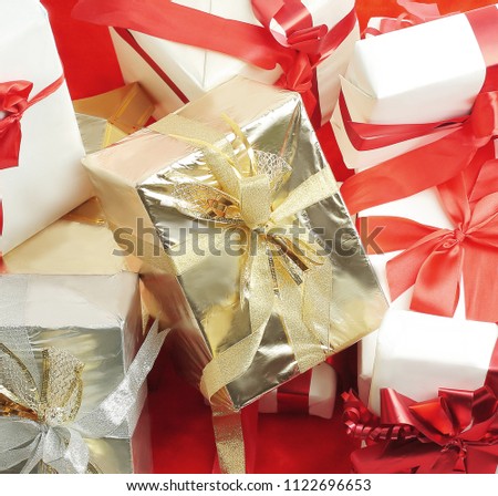 closeup. colorful gift boxes.isolated on red