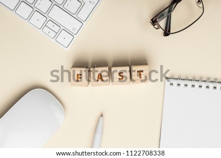 FAST Word Written In Wooden Cube Conceptual White Office Stuffs