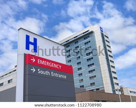 direction sign with capital letter H for hospital