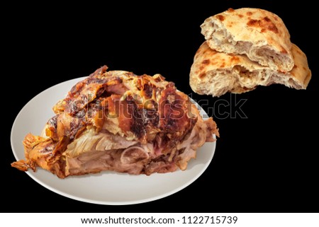 Juicy Fresh Spit Roasted Pork Ham Chunk with Leavened Flatbread Torn Loaf Isolated on Black Background