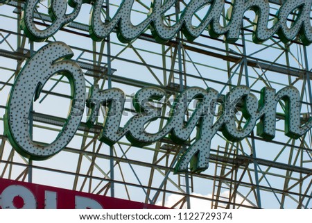 Iconic Portland Oregon Stag Neon Welcome Sign Blue Sky Background