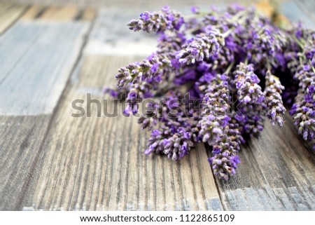 Lavender on a wooden background stock images. Bunch of french lavender. Relaxing scented lavender flowers on empty wooden background
