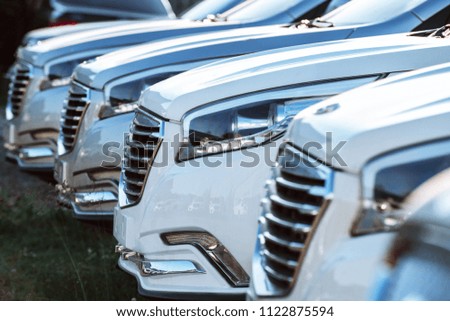 cars located row at shallow depth of field