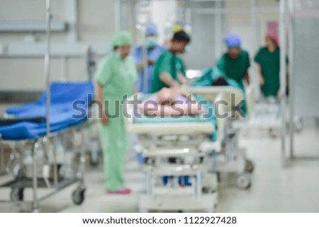 Blurred of medical team moving patient to surgery in operating room at the hospital.