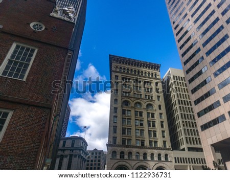 The Ames Hotel building in Boston, United States and other buildings around.
