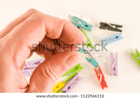 Photo picture of multicolored clothespin background texture