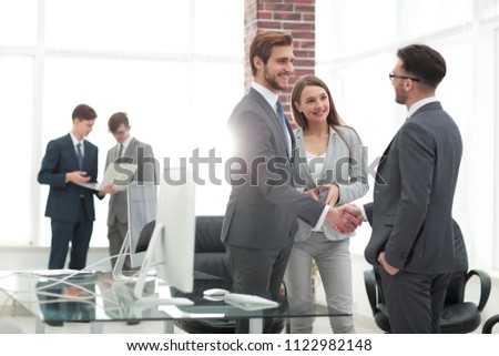 handshake business partners at a meeting Royalty-Free Stock Photo #1122982148