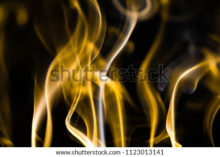 Abstract gplden smoke like colorful gradient background with flash light flare
