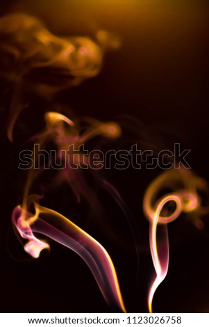 Abstract orange  light smoke like colorful gradient background with flash light flare for your design.
