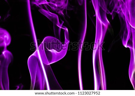 Abstract purple  light smoke like colorful gradient background with flash light flare for your design.
