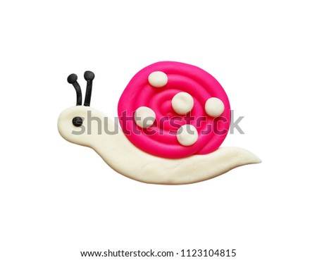 Plasticine pink snail isolated on a white background. Clipping path.