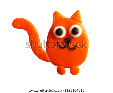 Plasticine orange cat  isolated on a white background. Clipping path.