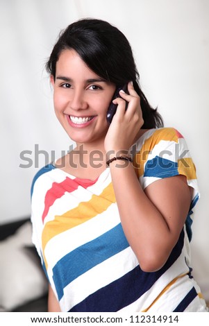 woman talking on phone with great happiness