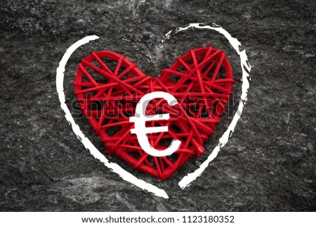 Love of money. Euro symbol on a red heart. Love theme