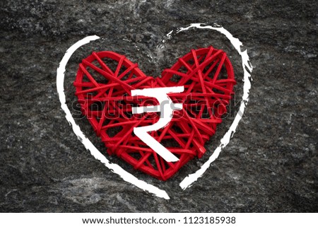 Love of money. Rupee symbol on a red heart. Love theme