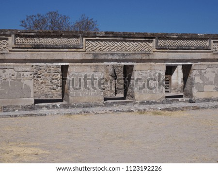 Patio walls of San Pedro church in city of Mitla, archeological site of Zapotec culture in Oaxaca state at Mexico landscapes, clear blue sky in 2018 warm sunny winter day, North America on February
