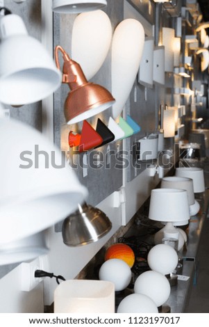 Image of different lamp with lights in the  designer furniture store 