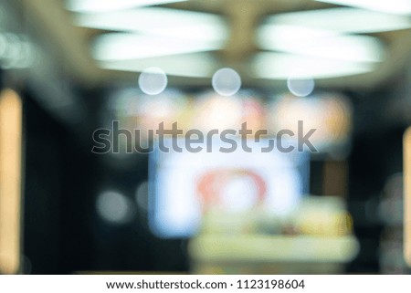 Blur shopping mall with bokeh light abstract background.