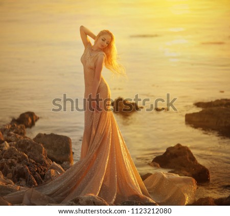 Calm Woman Meditating on Sunset
