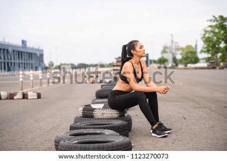 Athlete at the top of the mountain doing workout