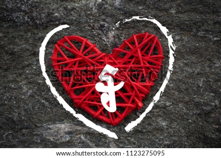 Love of money. Cambodian Riel symbol on a red heart. Love theme
