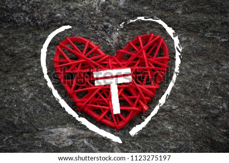 Love of money. Kazakhstan tenge symbol on a red heart. Love theme
