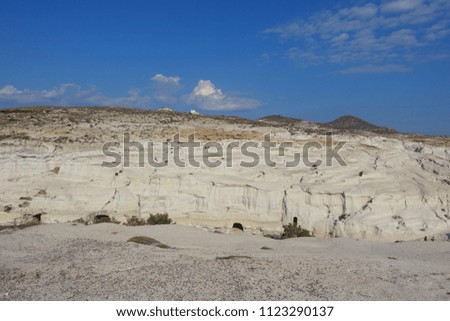Photo from famous white volcanic rock formations - caves in Sarakiniko beach, Milos island, Cyclades, Greece             