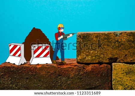 Cartoon worker drilling into the old brick