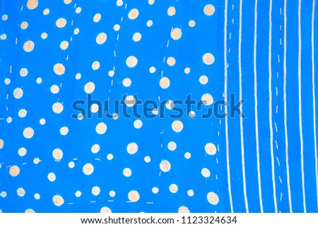 Close up of blue and white colored fabric texture used as wallpaper or website theme.