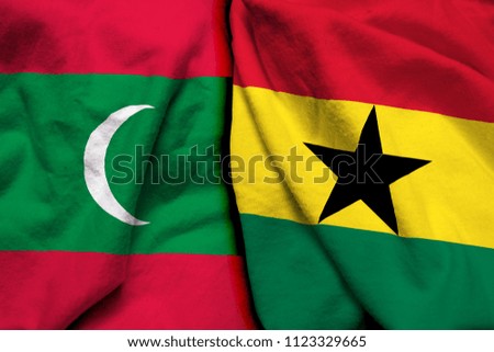 Maldive and Ghana flag on cloth texture