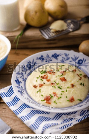 Mashed potatoes, fresh herb and crispy bacon in, food photography, stock food photo