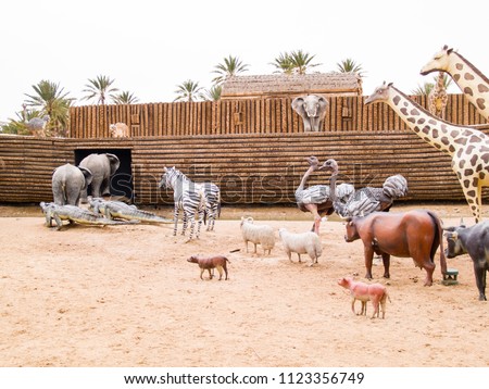 the animals climb on Noah's Ark, prehistoric park in Tunisia, Tozeour Royalty-Free Stock Photo #1123356749