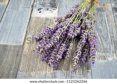 Lavender on a wooden background stock images. Bunch of french lavender. Relaxing scented lavender flowers on empty wooden background