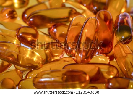 Vitamin e. Fish oil capsules on white background. Copy space for your text, high resolution product.
