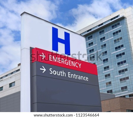 direction sign with capital letter H for hospital