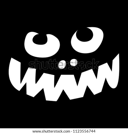Halloween pumpkin face on a black background