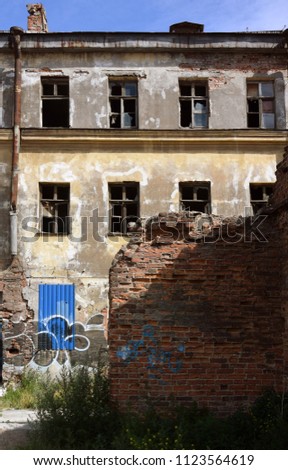 A photo of the background with the old destroyed abandoned building
