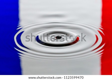 France Water dripping or water ripples in a pond. waves of rippling  flag of country