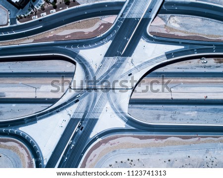 Aerial photograph of a crossing large elevated expressway.
Satellite view aerial photograph.