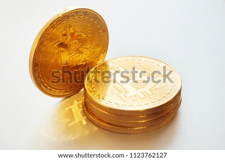 shiny golden bitcoins on white background, isolated. digital currency,  bit coin, cryptocurrency concept.space for text, digital money with reflection. technology worldwide network currency