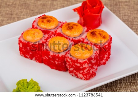 Baked Japanese roll with spicy sauce