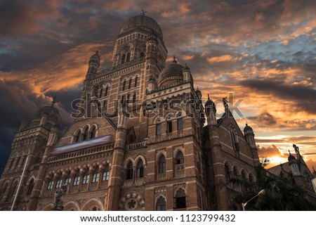 Chhatrapati Shivaji, the former Victoria Terminus - a historical railway station in the Indian city of Mumbai, one of the busiest in India. Royalty-Free Stock Photo #1123799432