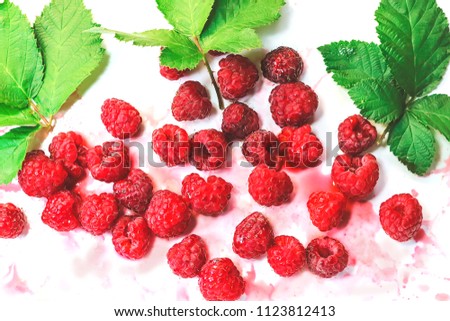 raspberry and juice in a white background