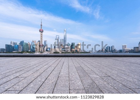 empty square with panoramic city skyline in shanghai china