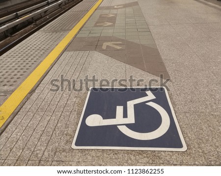handicap sign on the train station